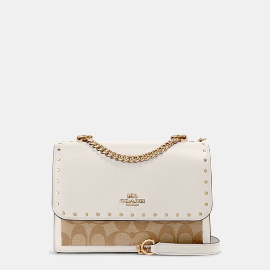 Signature Snake Embossed Mix Rivets Klare Crossbody Bag - Image 1