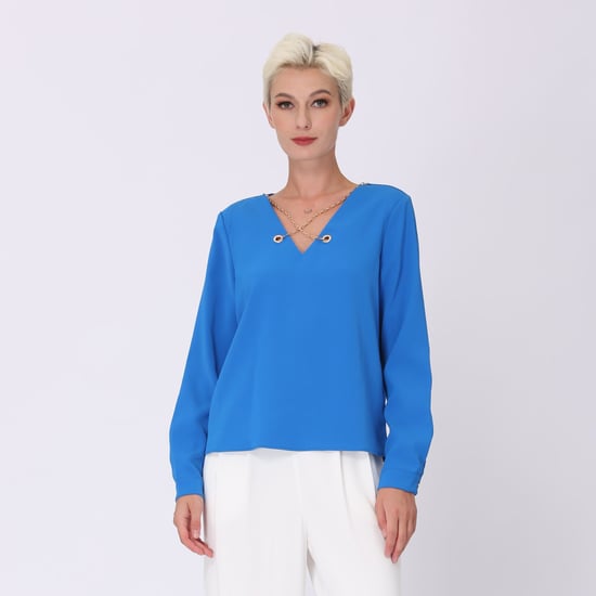 V -neck blouse and decorative chain - Image 1