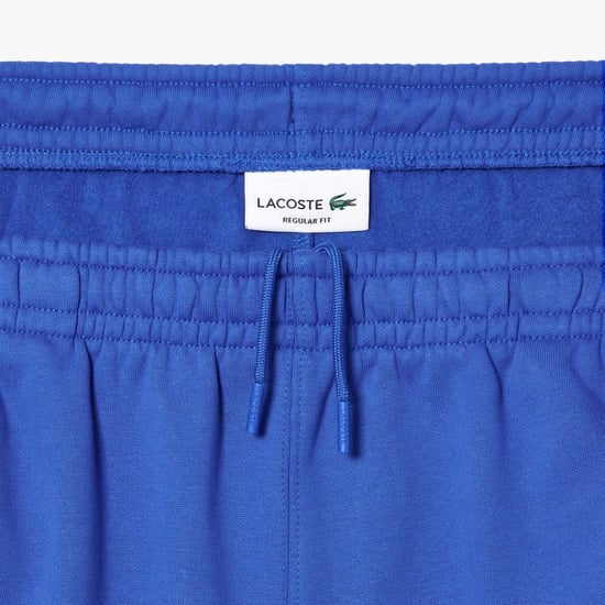 Men's Lacoste Logo Stripe Fleece Jogger Shorts in Blue