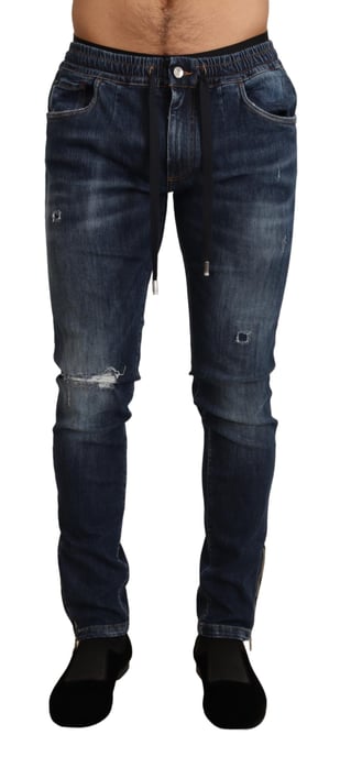 Jeans de mezclilla rasgados de algodón elástico azul para hombre de Dolce & Gabbana - Image 1