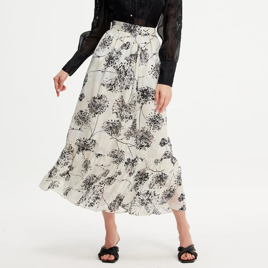 Long skirt with linear print and ruffles - Image 1