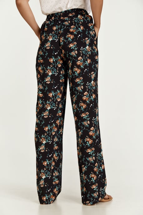 Pantalones anchos con print de flores negros - Image 4