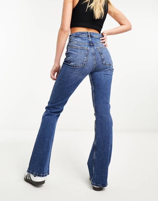 ASOS DESIGN flared jeans in mid blue