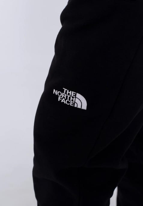 The North Face NSE Hombre Pantalón Jogger De Polar Con Puños Negro - Image 4