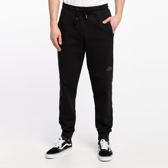 The North Face Joggers NSE LIGHT Con Bolsillos Y Cremallera Negro Hombre - Image 1
