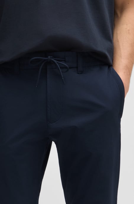 Men's Boss Tapered-Fit Chinos in Dark Blue - Image 4