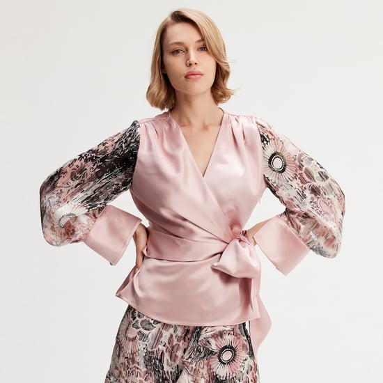 Cross heart top with floral print sleeves - Image 1
