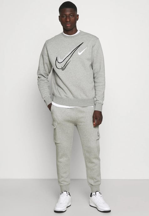 Chándal con cuello redondo y logo multicolor de Nike para hombre en gris - Image 1
