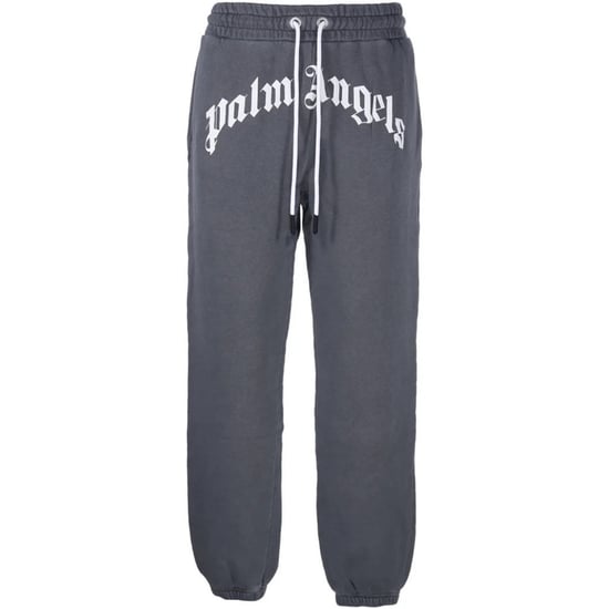 Palm Angels GD pantalones deportivos negros desgastados con logo curvado - Image 1
