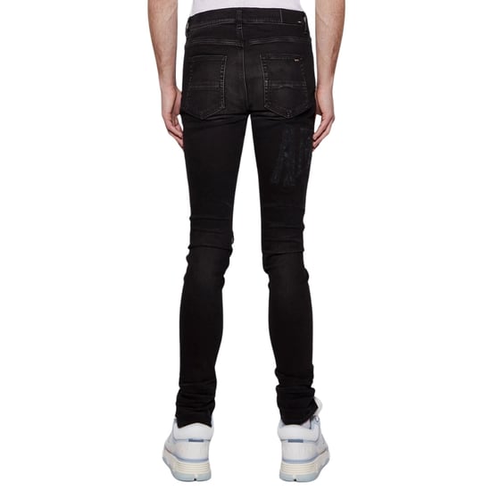 Vaqueros Amiri de corte slim y desgastados con logo Amiri envejecido en denim negro - Image 2