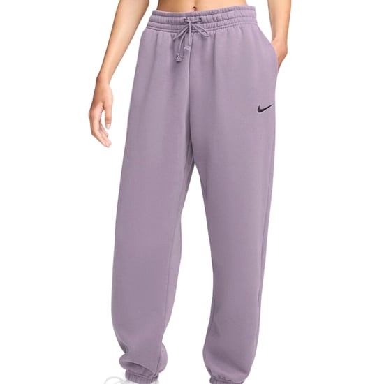 Nike pantalones deportivos lisos morados - Image 1