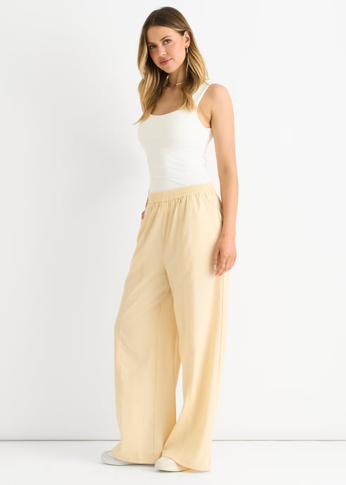 Pantalones de cintura elástica color crema - Image 3