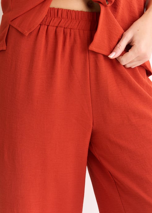 Pantalones de pata ancha con cintura elástica en óxido - Image 2