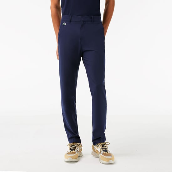 Men's Lacoste Sport Stretch Golf Chinos in Navy - Image 1