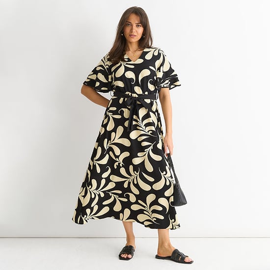 Vestido midi floreado con escote en V y cintura elástica - Image 1