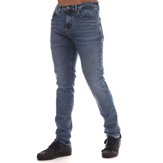 Jeans de hombre Tommy Hilfiger Scanton con bordado de bandera en azul, corte slim-fit - Image 2