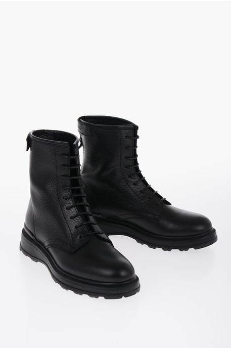 Botas de combate de cuero texturizado con cremallera en color negro - Image 1