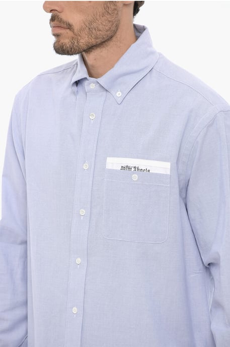 Camisa de algodón piqué con botones y bolsillo en el pecho en azul claro - Image 3