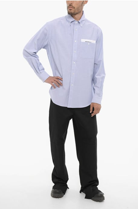 Camisa de algodón piqué con botones y bolsillo en el pecho en azul claro - Image 4