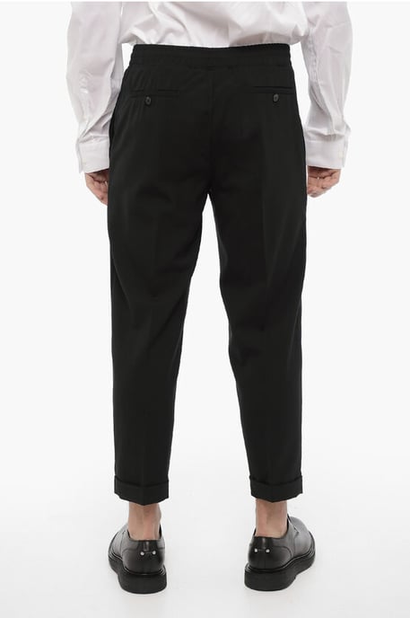 Pantalones casuales ajustados con dobladillo con puños en negro - Image 2