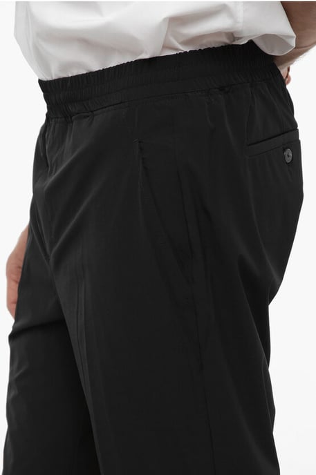 Pantalones de nailon REM con cintura elástica en color negro - Image 3