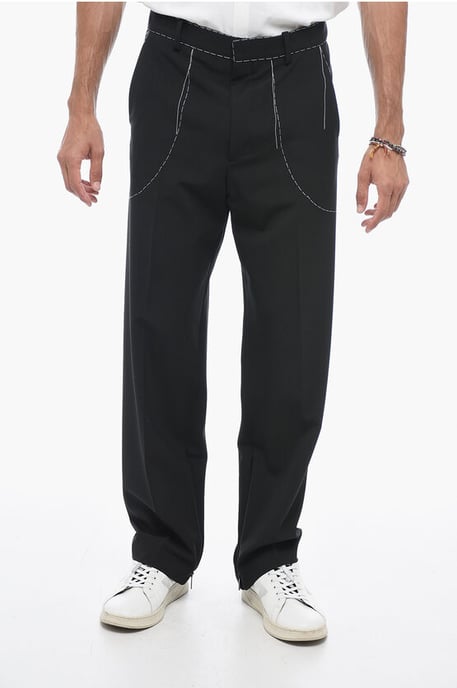 Pantalones de sastrería con detalles de costura en negro - Image 1