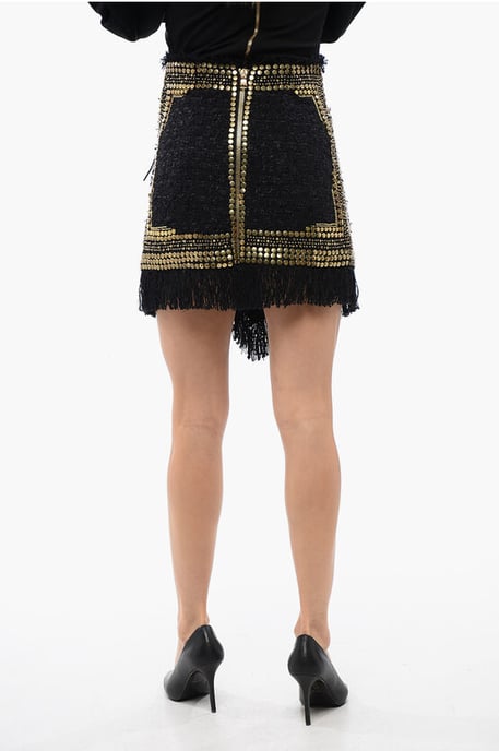 Minifalda cruzada con flecos y tachuelas en negro - Image 2