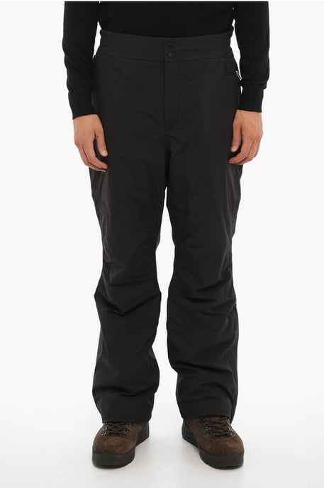 Pantalones de esquí acolchados de tela impermeable en negro - Image 1