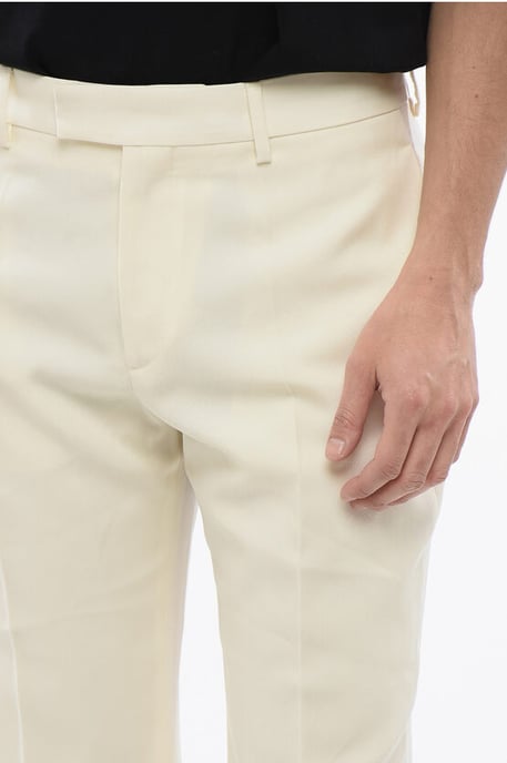 Pantalones acampanados en beige - Image 3