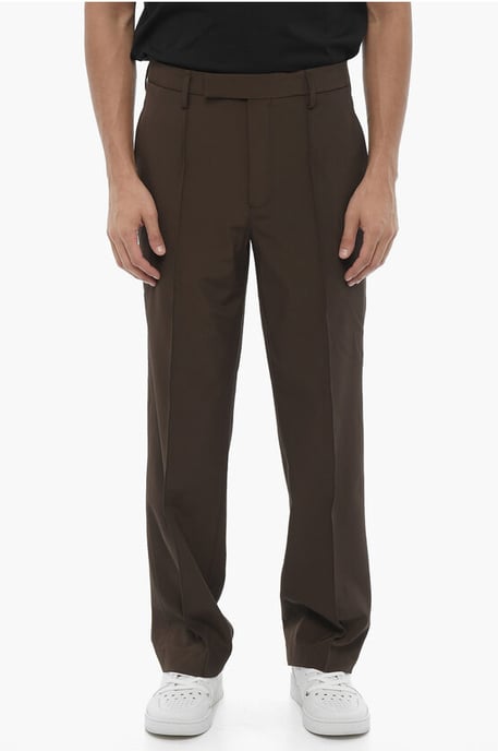 Pantalones de tejido técnico de corte ajustado en color marrón - Image 1