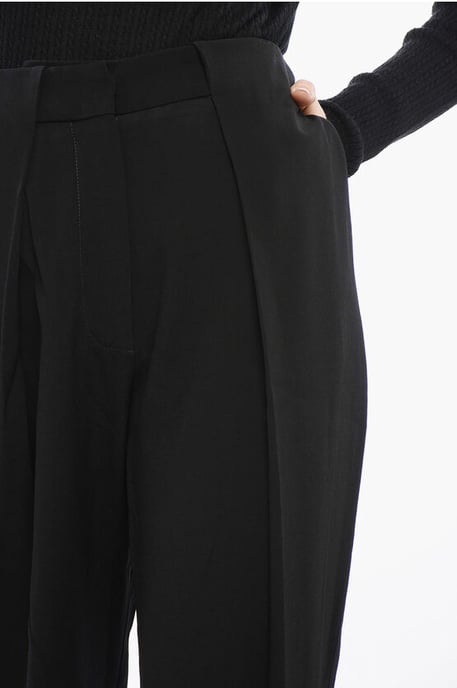 Pantalones negros de cintura alta y corte cónico - Image 2