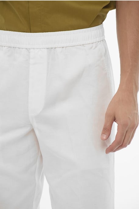 Pantalones REM de corte entallado con cintura elástica en color blanco - Image 3