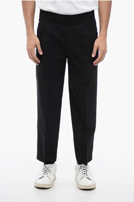 Pantalones de mezcla de lino de corte cónico con doble pliegue en negro - Image 1