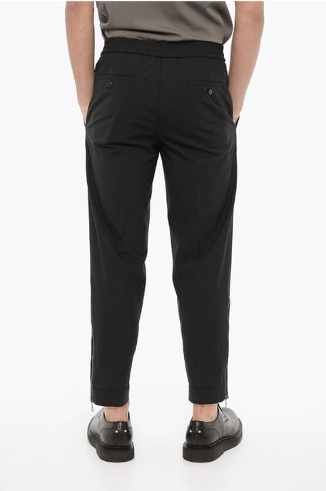 Pantalones ajustados con cremallera en el tobillo en negro - Image 2