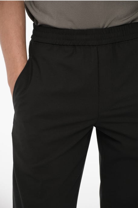 Pantalones ajustados con cremallera en el tobillo en negro - Image 4