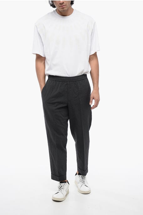 Pantalones REM de algodón arrugado en gris - Image 4