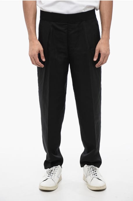 Pantalones de mezcla de lino de corte cónico con doble pliegue en negro - Image 1