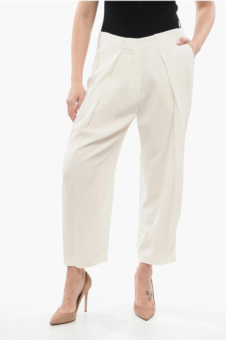 Pantalones de viscosa de corte cónico con pliegues simples en blanco - Image 1