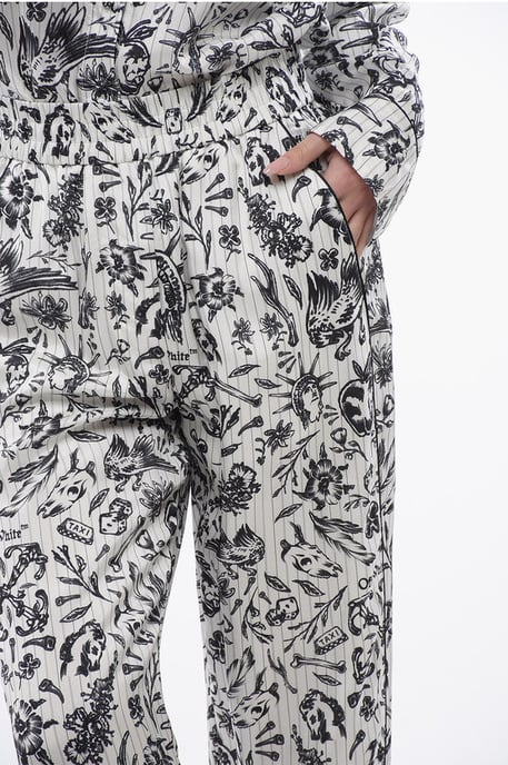 Pantalones Palazzo de pijama de satén con estampado de tatuajes en blanco y negro - Image 3