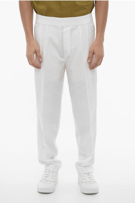 Pantalones ajustados con doble pliegue y cintura elástica en blanco - Image 1