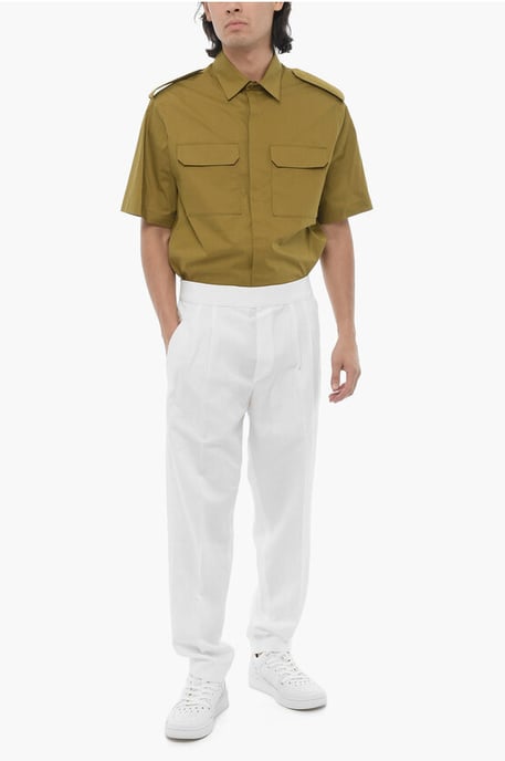 Pantalones ajustados con doble pliegue y cintura elástica en blanco - Image 4