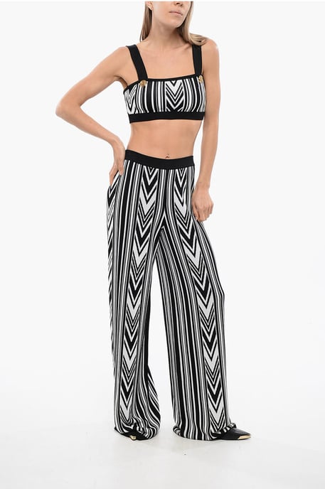 Pantalones anchos con estampado geométrico en blanco y negro - Image 4