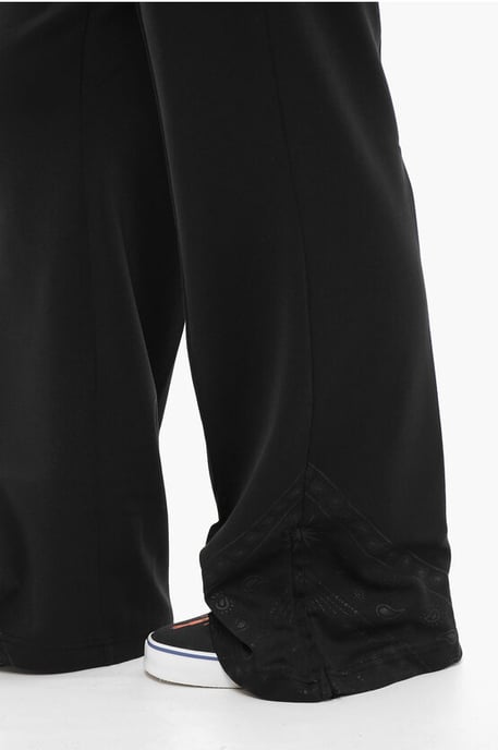 Pantalones deportivos de pierna ancha con cordón en la cintura en negro - Image 4