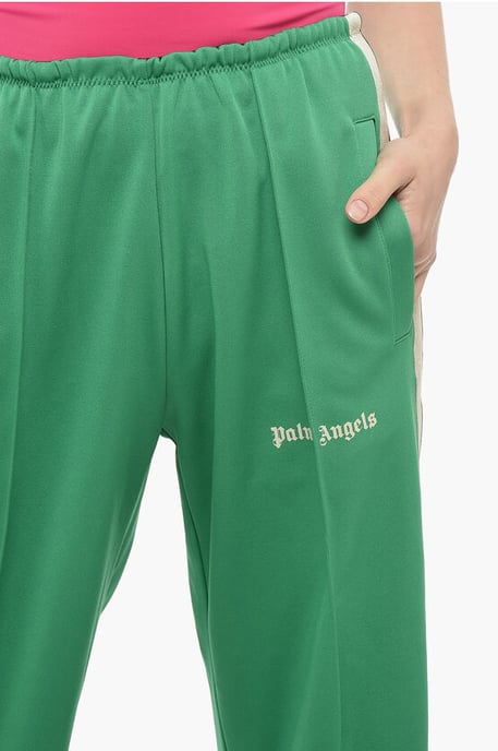 Pantalones acampanados deportivos con bandas laterales en contraste en verde - Image 3