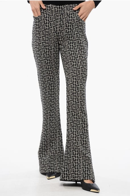 Pantalones acampanados de tiro bajo de lana en blanco y negro - Image 1