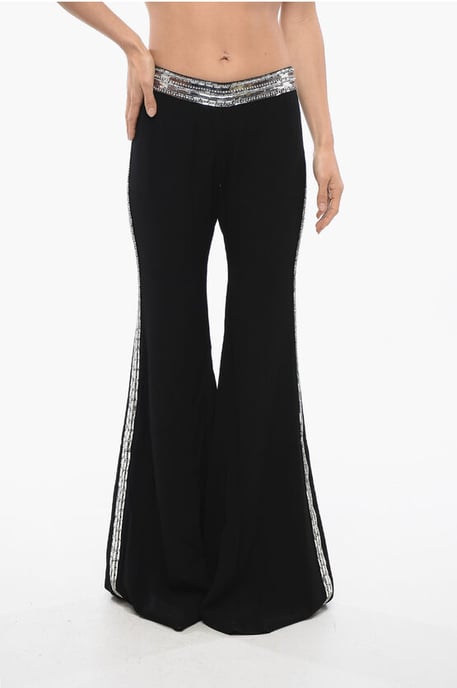 Pantalones acampanados con bandas laterales de lentejuelas en negro - Image 1