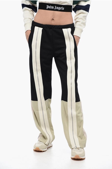 Pantalones deportivos con cremallera delantera - Image 1