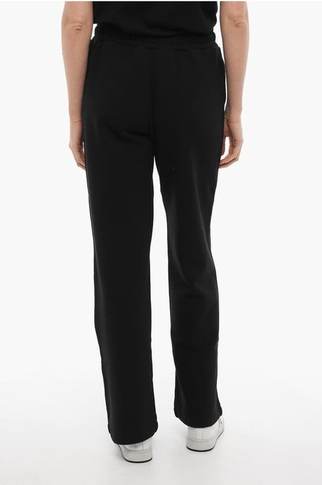 Pantalones deportivos de color liso con logotipo estampado en negro - Image 2