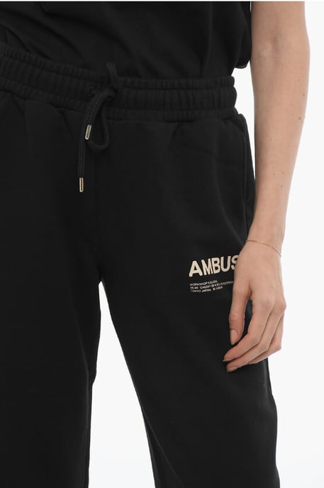 Pantalones deportivos de color liso con logotipo estampado en negro - Image 3