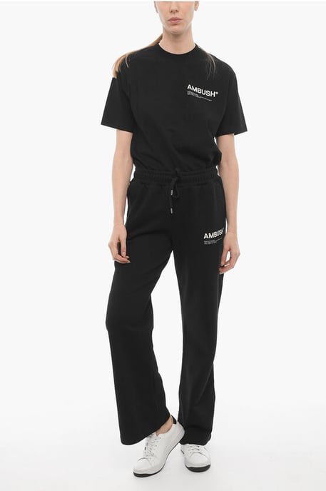 Pantalones deportivos de color liso con logotipo estampado en negro - Image 4
